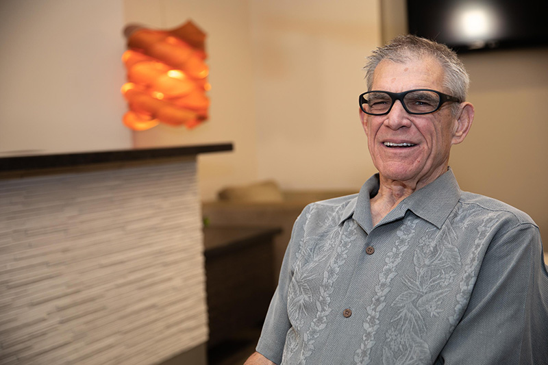 a patient named vern smiling with his new set of dentures