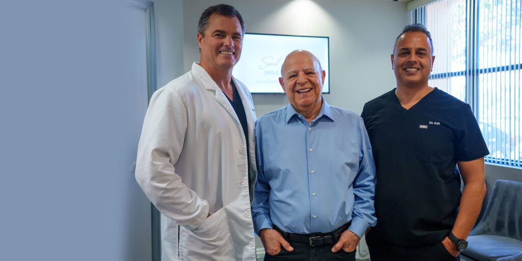 Dr clark michael with patient smiling