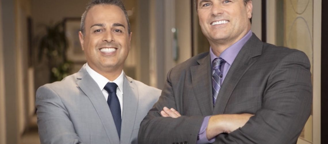 Drs. Michael K Clark & Ashkan Haeri Posing Together